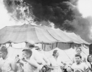 Circus Attendees Fleeing the Big Top as it is Engulfed in Flames